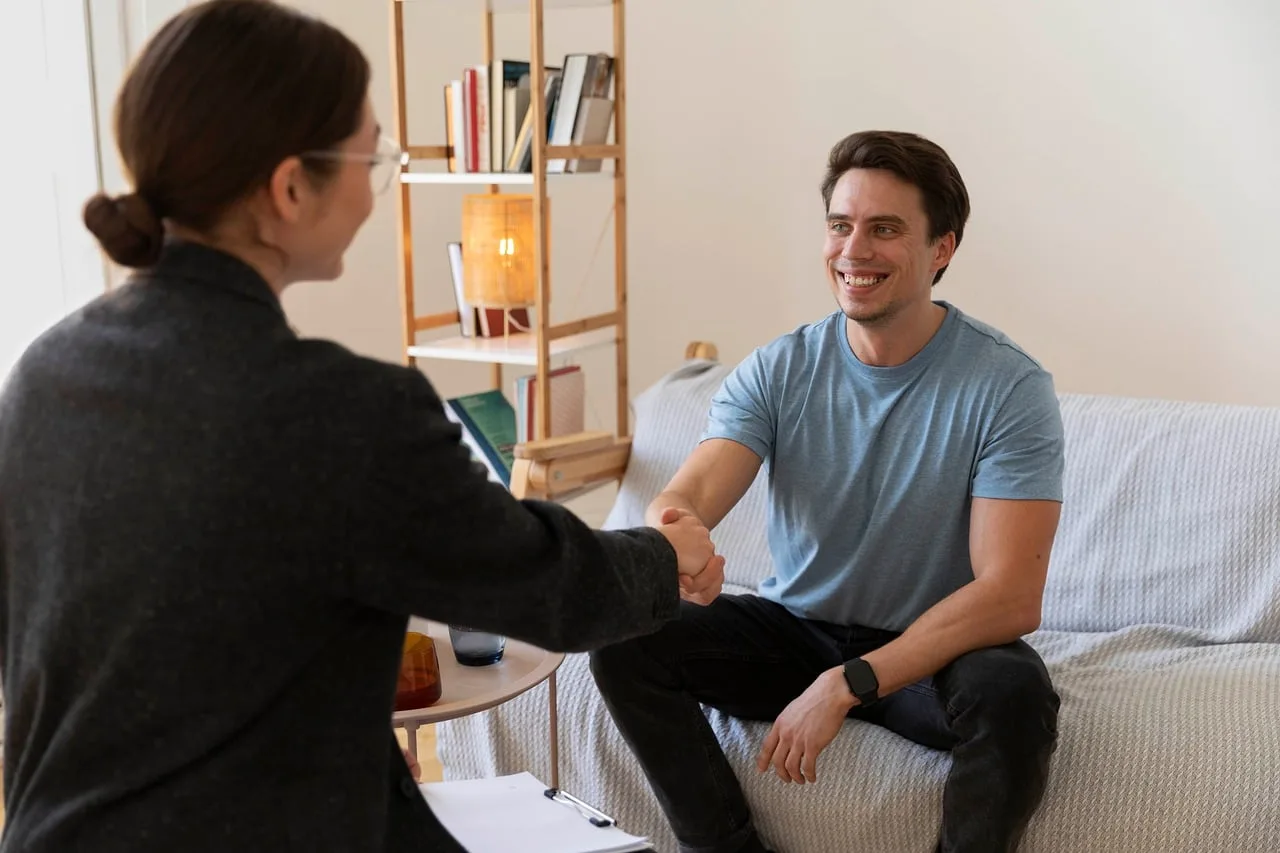 Therapist and patient in a supportive counseling conversation