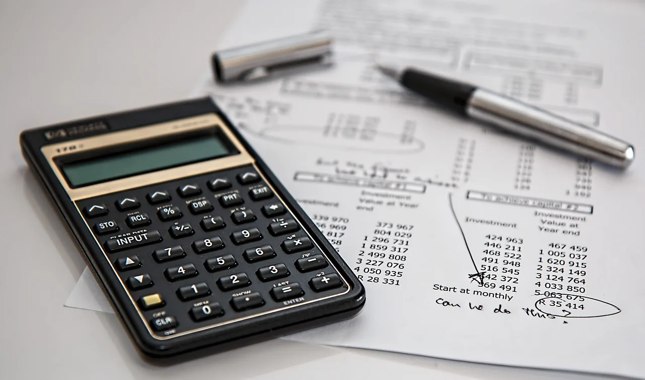 Remittance advice and payment posting documents on a desk