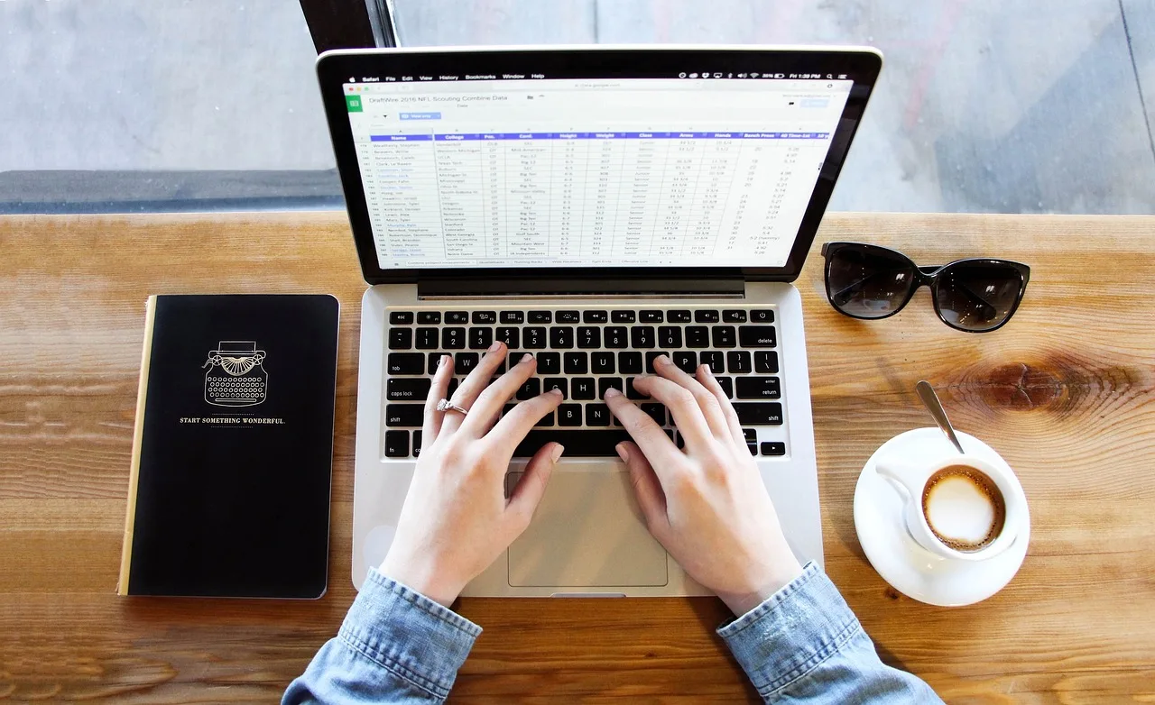 Billing specialist reviewing a claim status on a computer