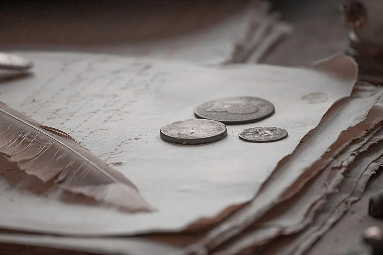 Magnifying glass over financial documents representing payment variance analysis